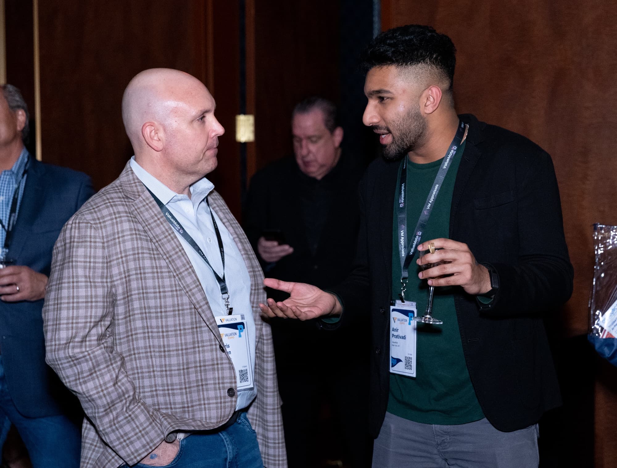 Anir Prativadi in conversation with a Valuation Expo attendee